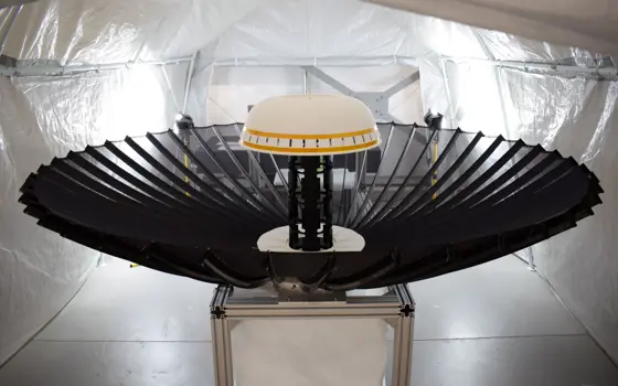 The Oxford Space Systems deployable antenna on a metal box.
