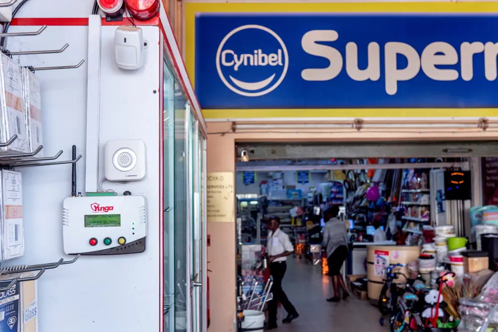 A security system affixed to a wall at a supermarket in Uganda.