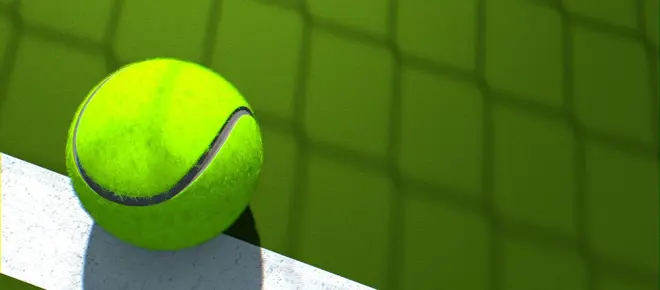 A bright green tennis ball against a dark green background