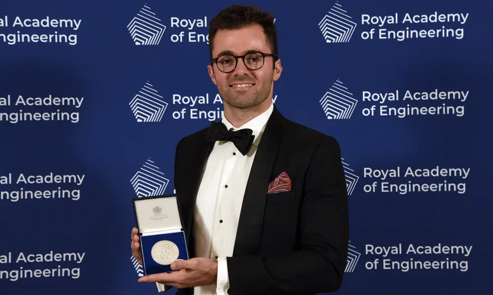 Dr Harrison Steele holding the Royal Academy of Engineering's Sir George MacFarlane Medal.