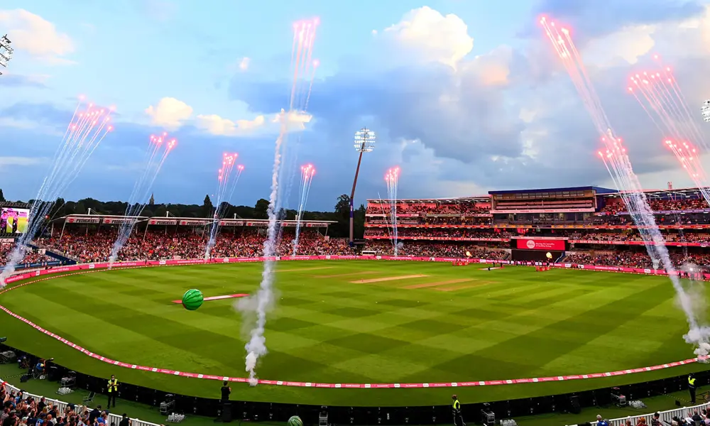 A photograph of a football field with fireworks.