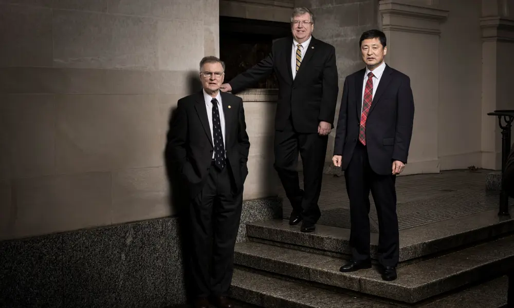 Michael Thompsett, Eric Fossum and Nobukazu Teranishi standing together.