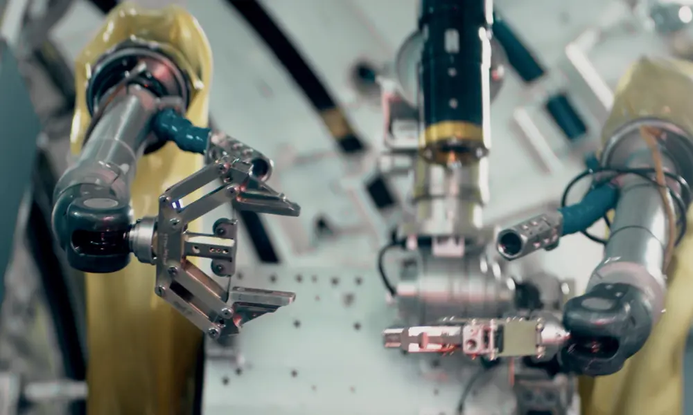 Two robot arms of a fusion energy robot.