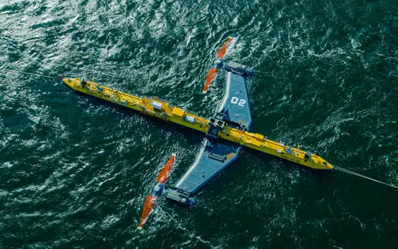 An aerial photograph of the Orbital O2 tidal turbine in the ocean.
