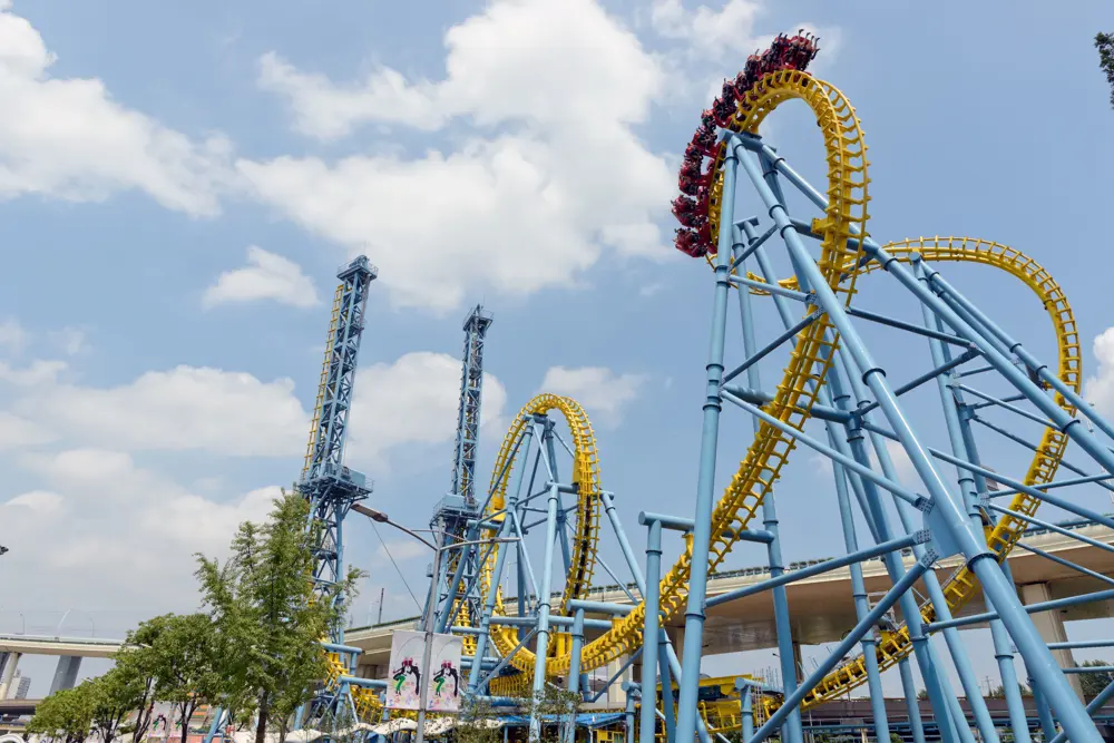 People riding the Vekoma Giant Inverted Boomerang at Shanghai Jin Jiang Park. 