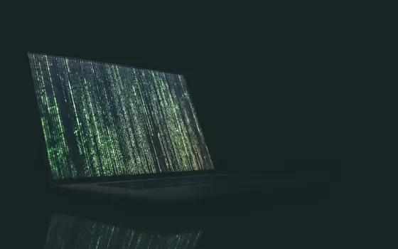 A laptop with green dotted vertical lines taking up the screen.