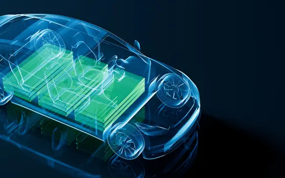 A computer rendering shows a transparent outline of a car in light blue with three green cuboids inside it